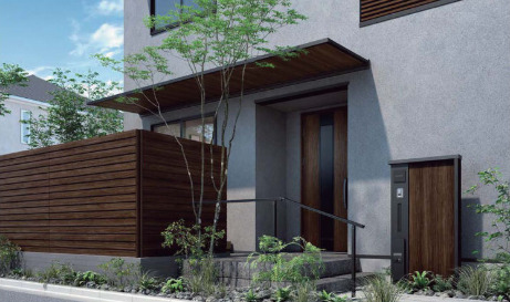 玄関アプローチをより素敵に。木調カラーで目隠しフェンスとコーディネートする。